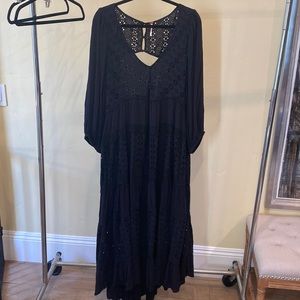 Black Eyelet Free People Dress, with open back, size XL.